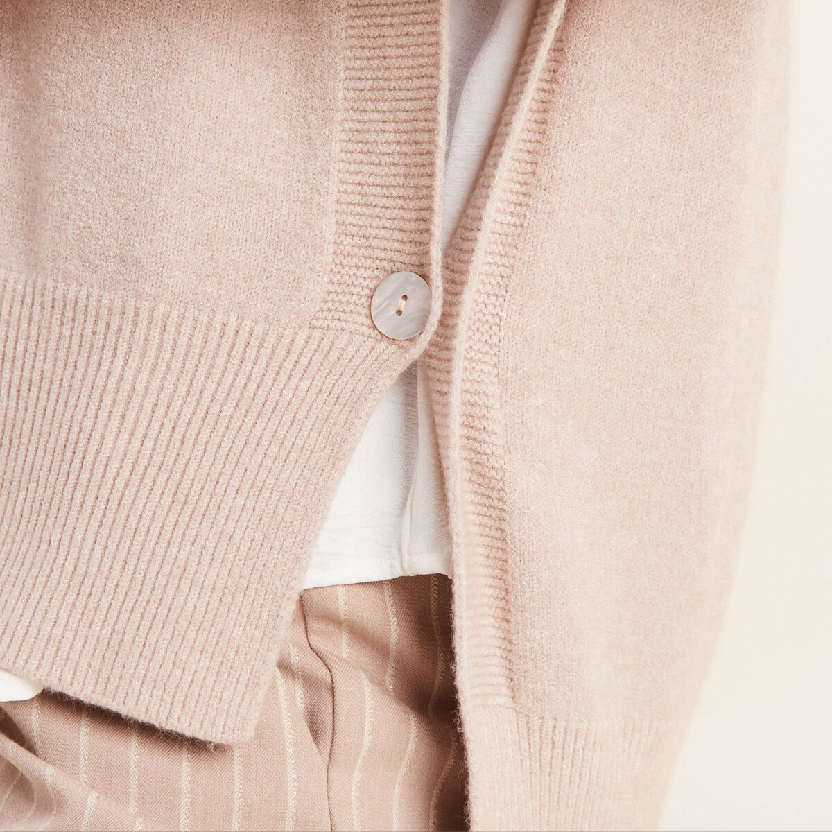 Pull sans manches creme femme