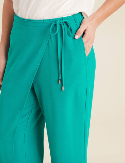 Pantalon flou avec pan vert émeraude femme