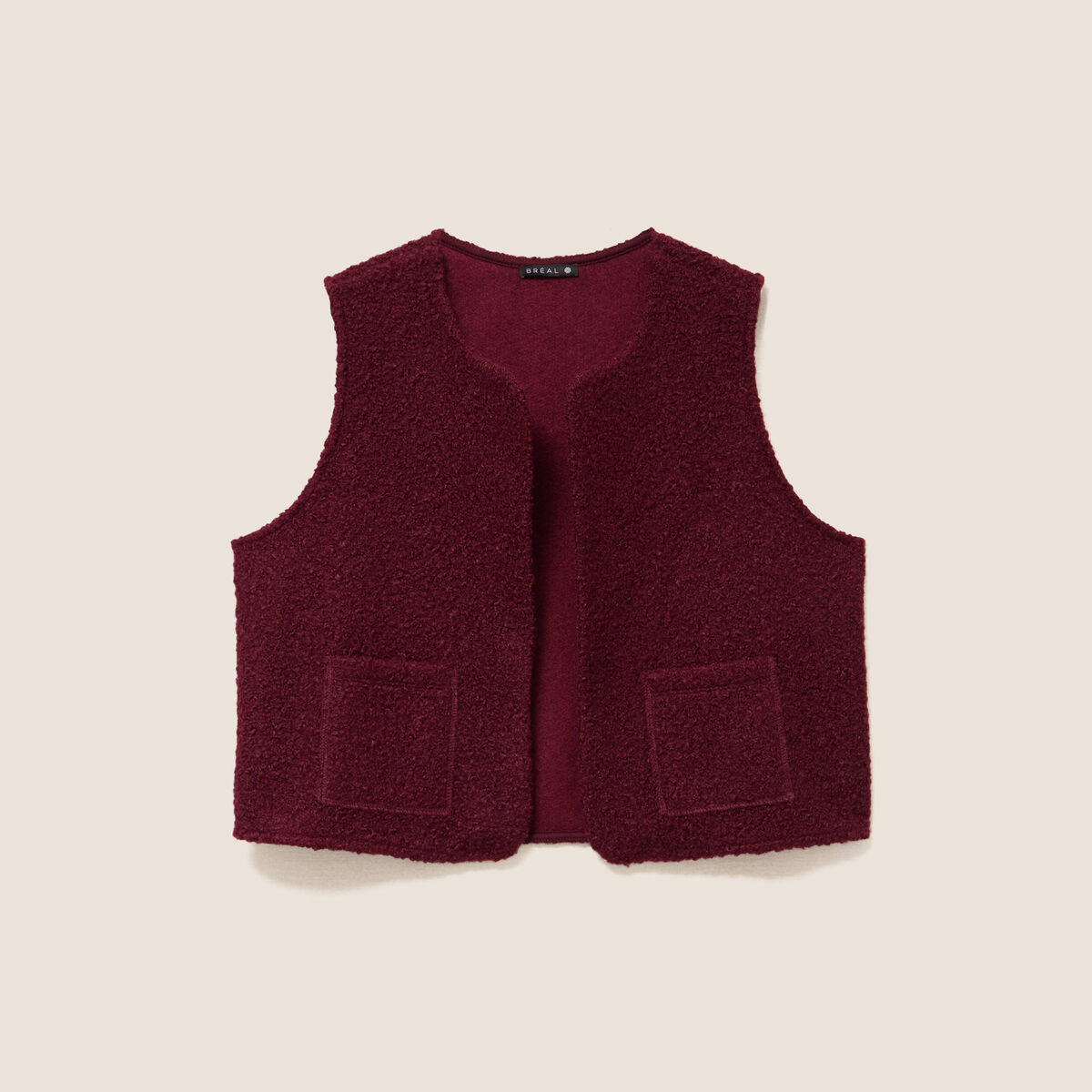 Gilet sans manches bouclette poches bordeaux femme