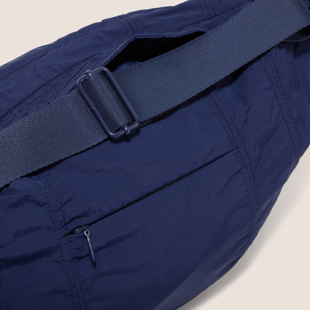Coupe-vent pliable sac banane bleu marine femme