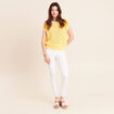 Pull ajour&eacute; sans manches col rond jaune pastel femme