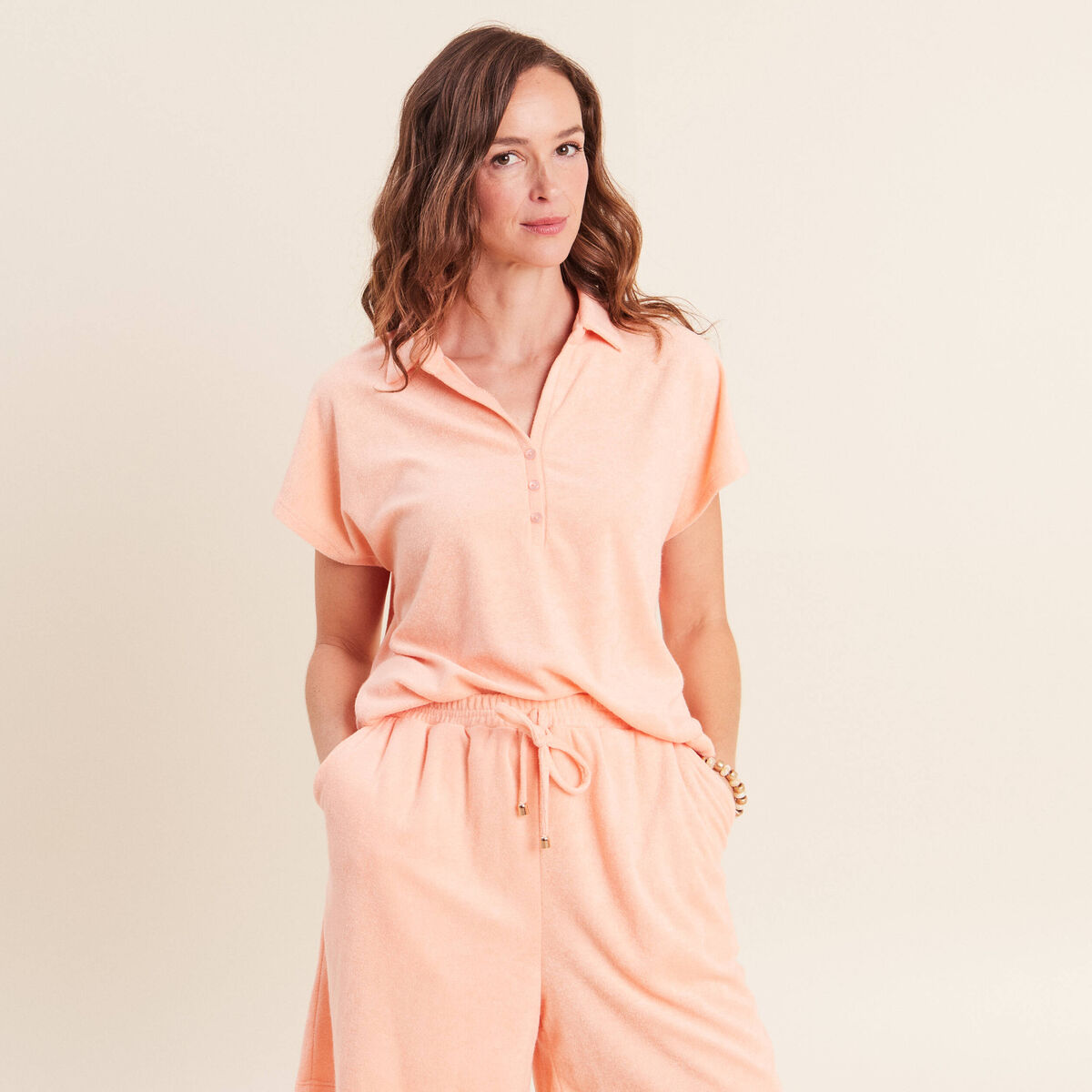 Polo droit col chemise manches courtes orange abricot femme