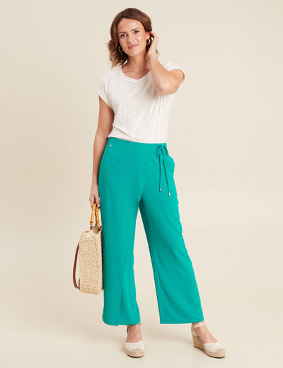 Pantalon flou avec pan vert émeraude femme