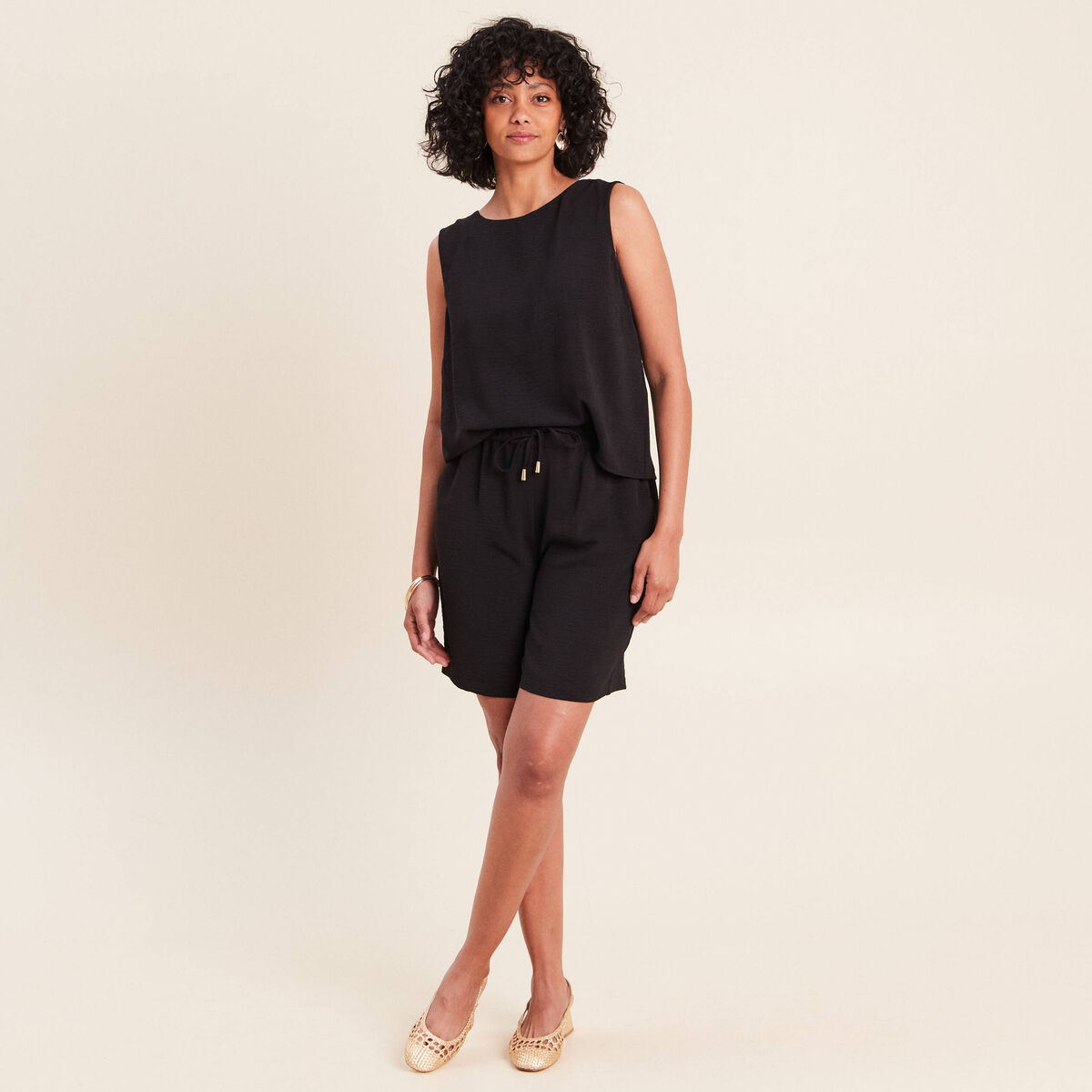 Blouse sans manches col rond fluide noir femme