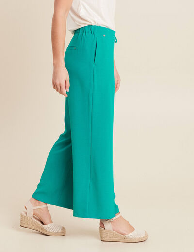 Pantalon flou avec pan vert émeraude femme
