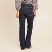 Jean magique L'Unique coupe bootcut denim brut femme