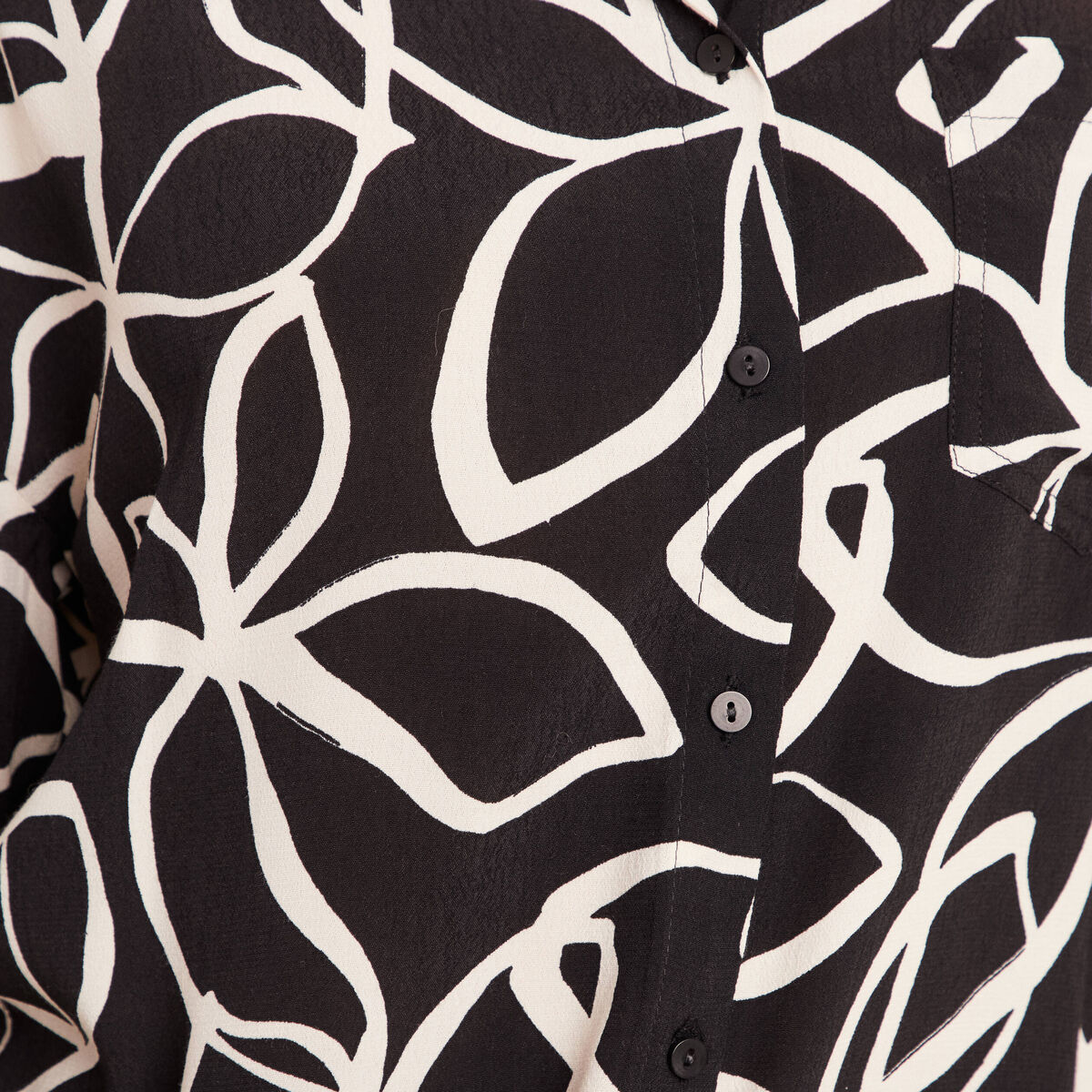 Chemise ample mi-longue manches longues noir femme
