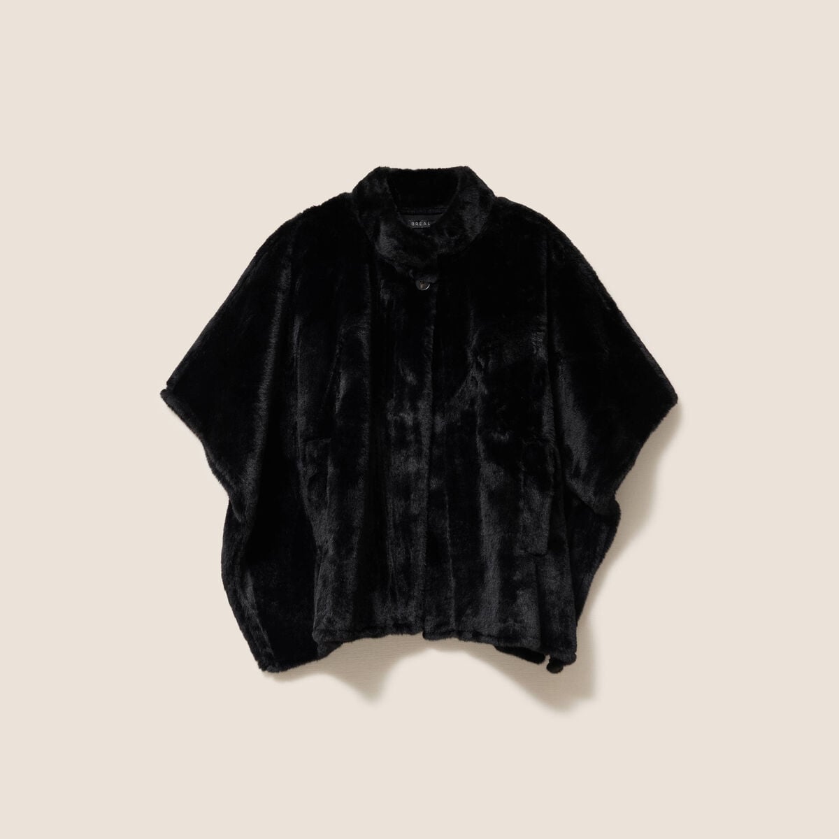 Poncho cape fausse fourrure noir femme