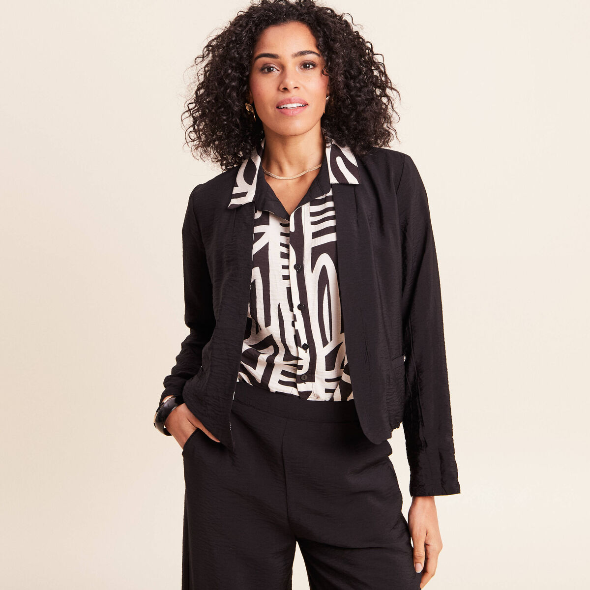 Veste r&eacute;versible manches longues noir femme