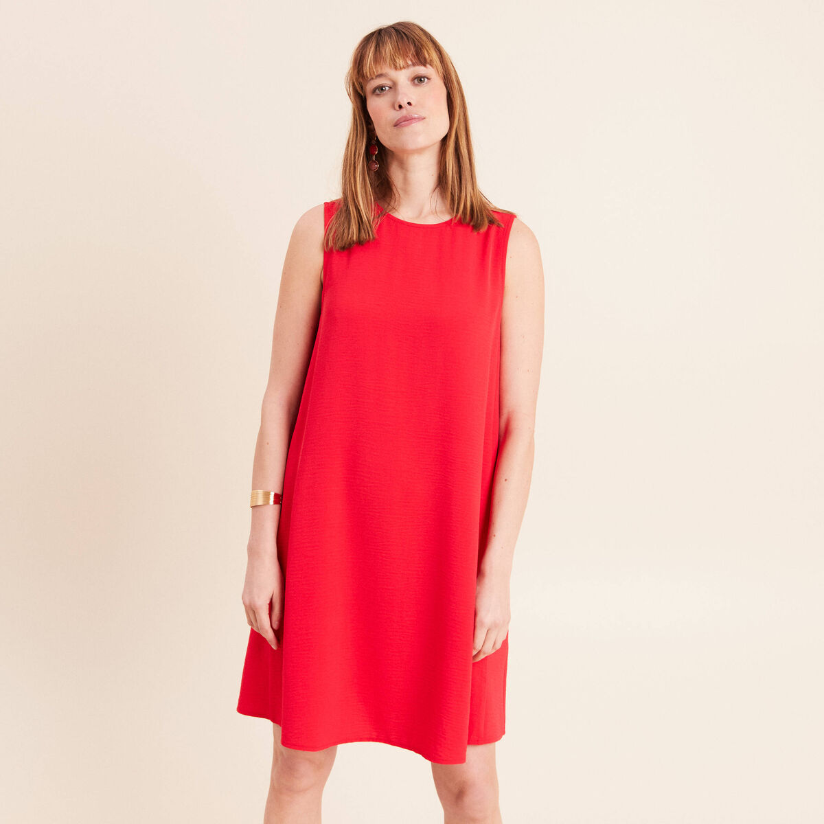 Robe courte &eacute;vas&eacute;e sans manches col rond rouge fluo femme