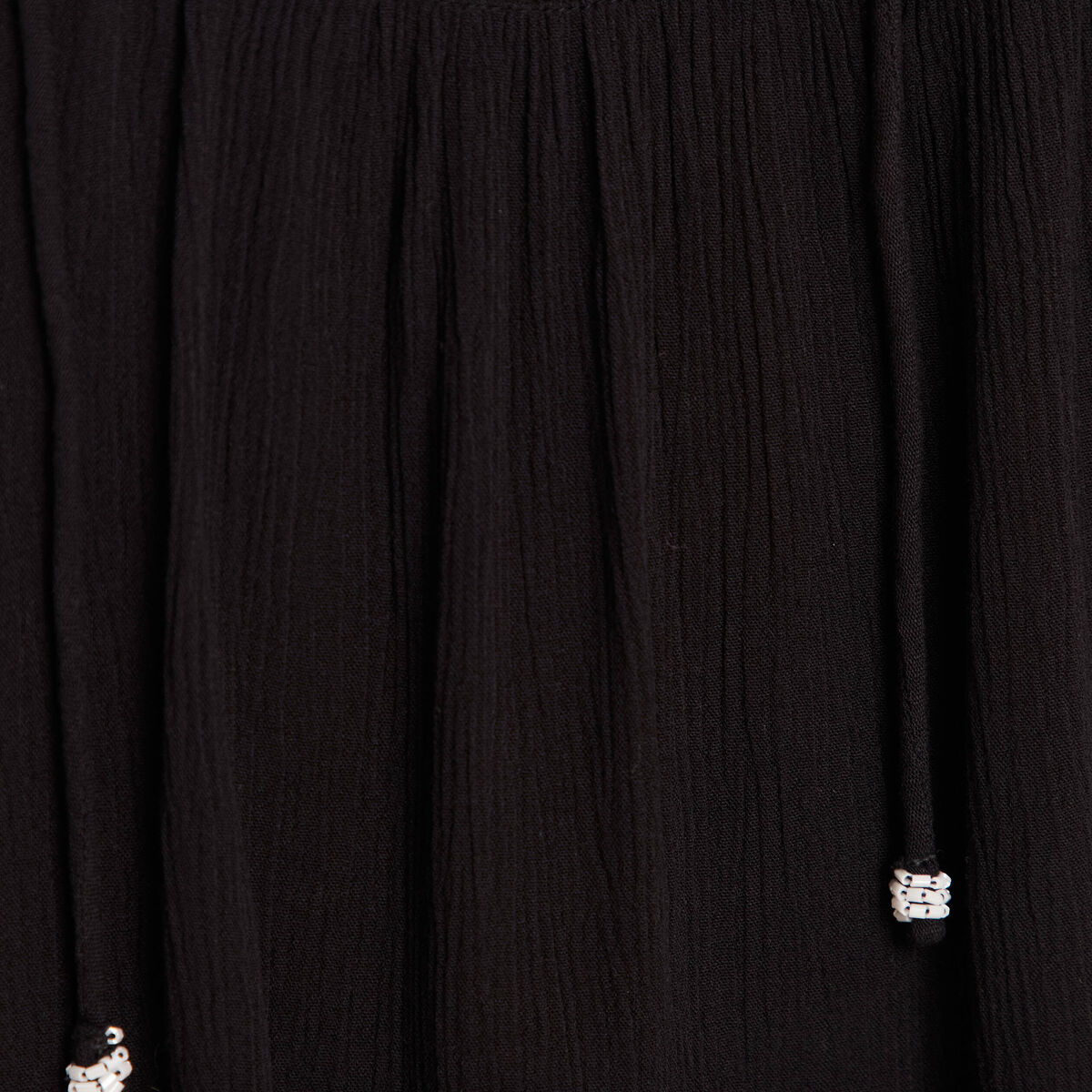 Blouse ample sans manches col rond noir femme