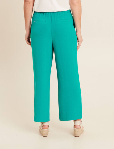 Pantalon flou avec pan vert émeraude femme