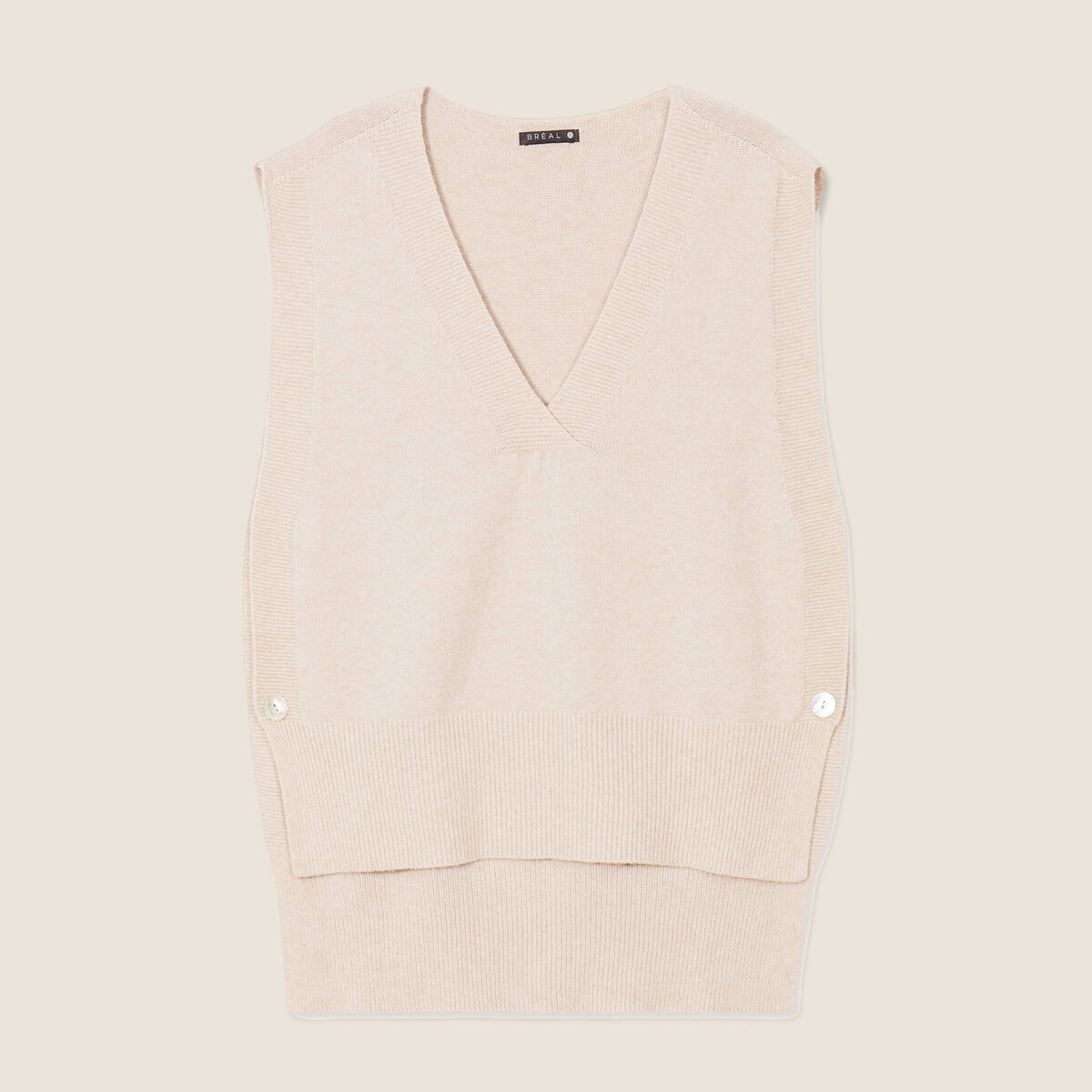 Pull sans manches creme femme
