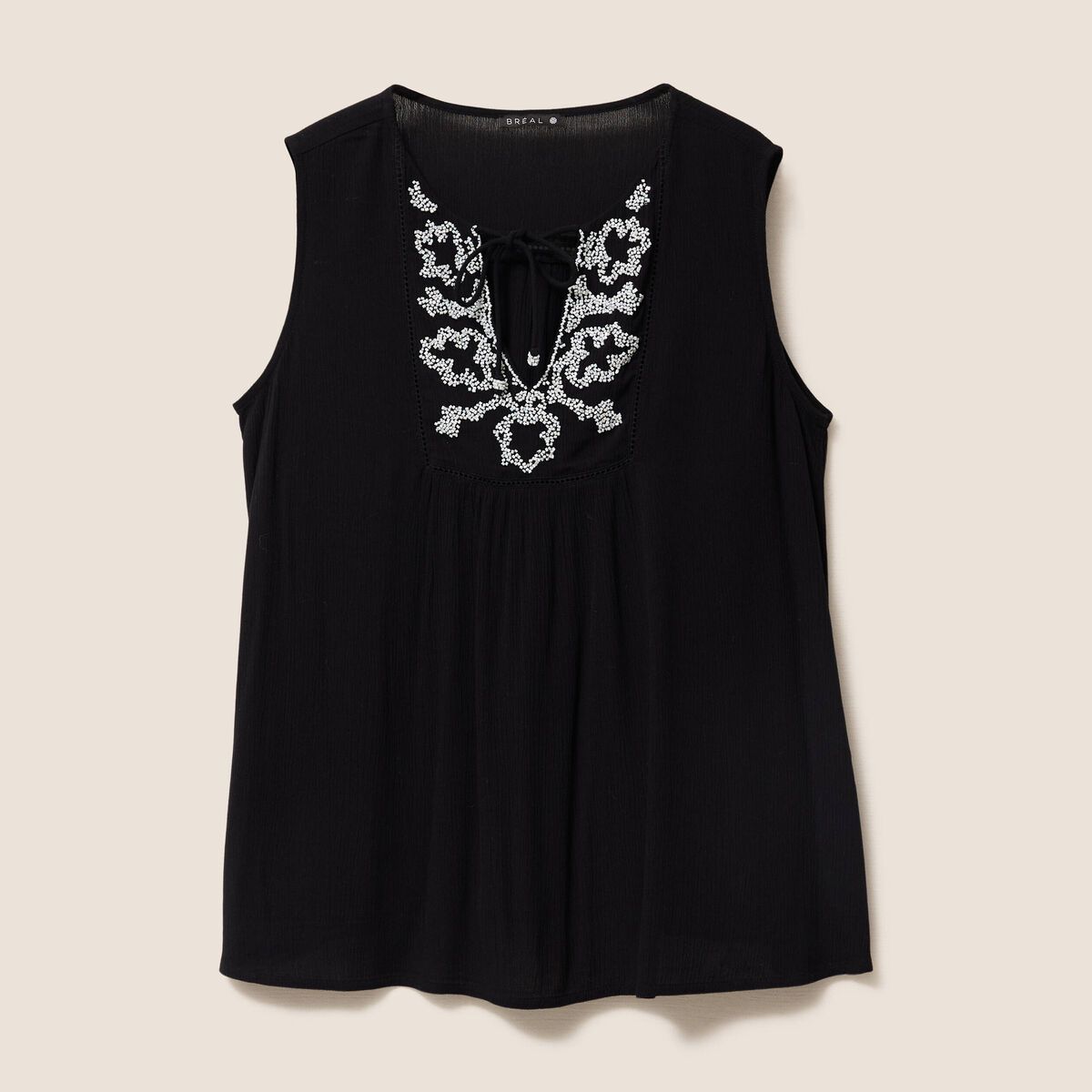 Blouse ample sans manches col rond noir femme