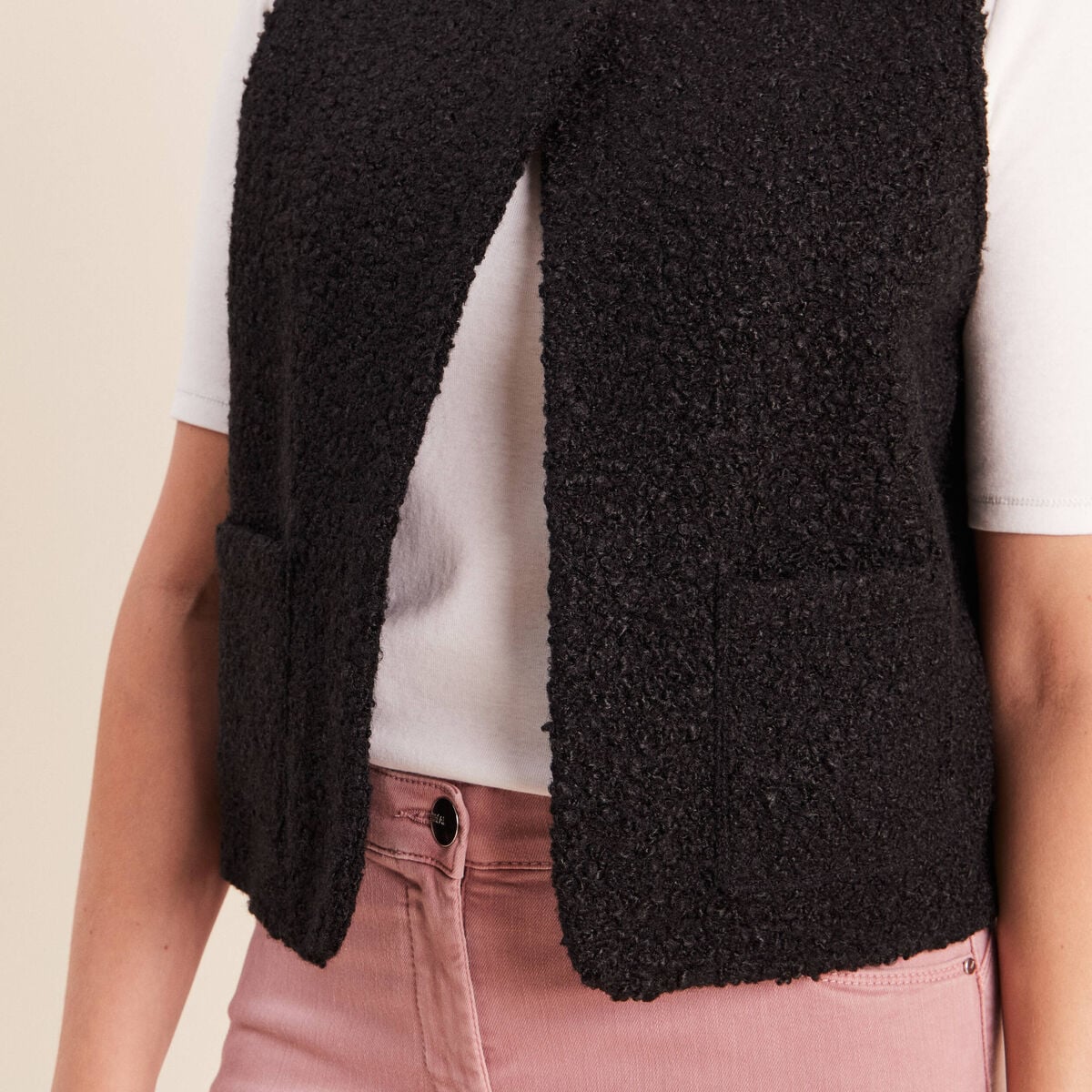 Gilet sans manches bouclette poches noir femme