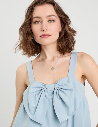 Blouse effet boule et noeud bleu clair femme
