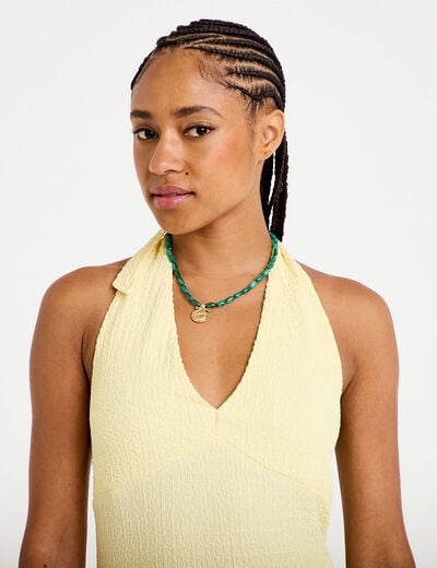Top cintr&eacute; sans manches avec relief jaune pastel femme