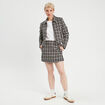 Jupe-short trap&egrave;ze tweed noir femme