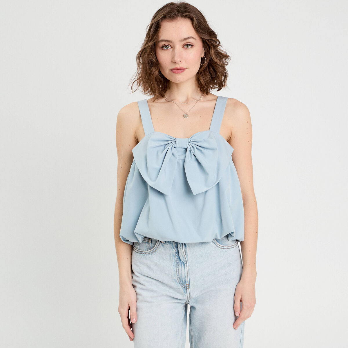 Débardeur effet boule et noeud bleu clair femme