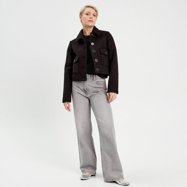 pull avec clous et noeud noir femme Pull avec clous et noeud noir femme