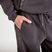 Jogging &agrave; d&eacute;tails clout&eacute;s taille basse gris fonc&eacute; femme