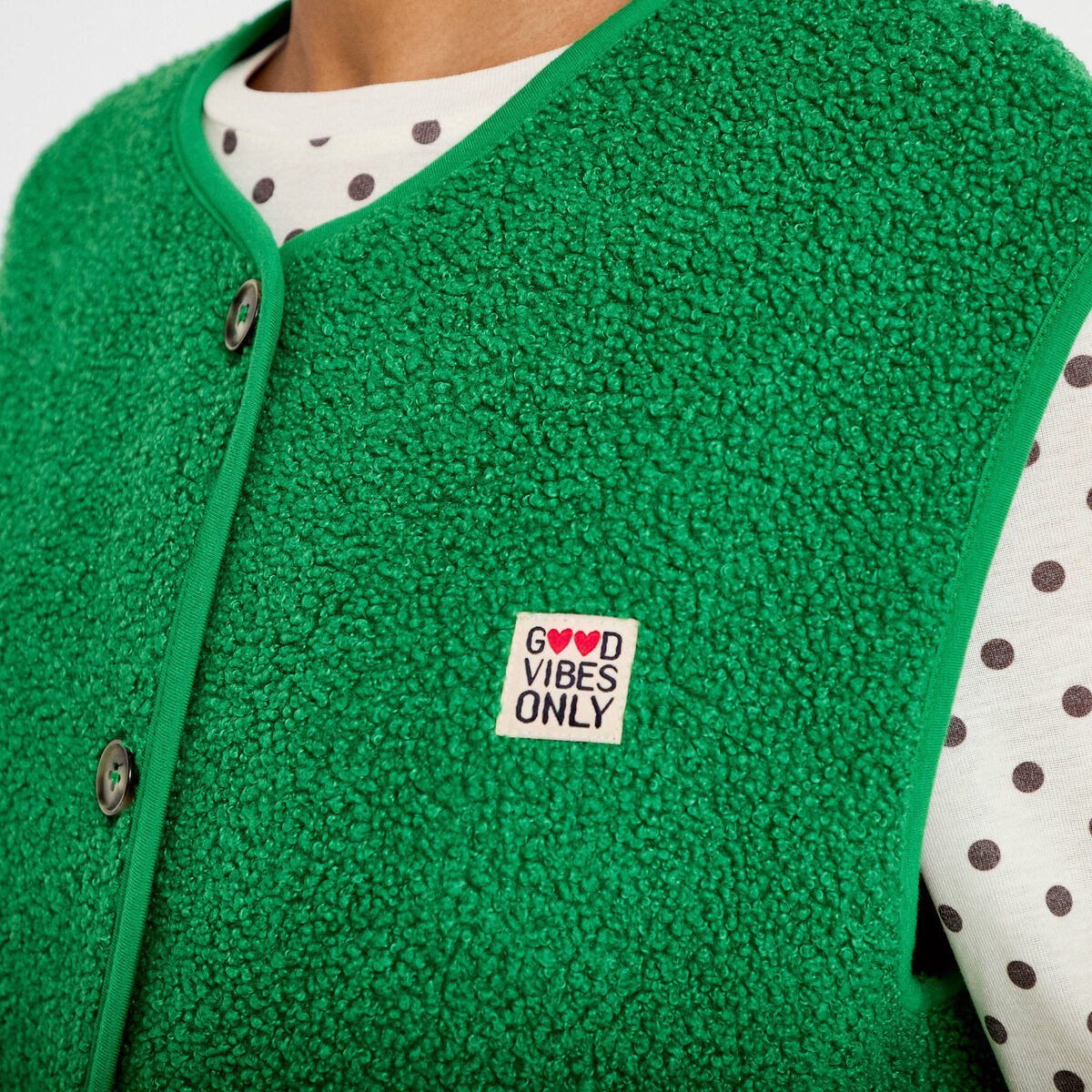 Gilet sans manches fausse fourrure vert fonc&eacute; femme