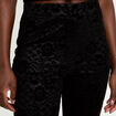 Pantalon bootcut effet dentelle noir femme
