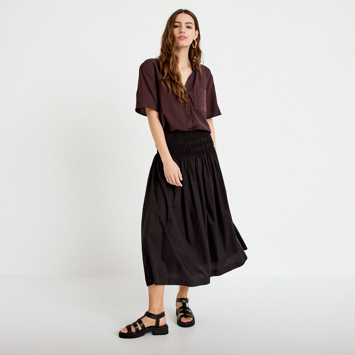 Jupon &eacute;vas&eacute; taille smock&eacute;e noir femme