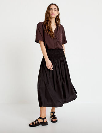 Jupon &eacute;vas&eacute; taille smock&eacute;e noir femme