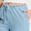 Pantalon large en jean denim bleach femme