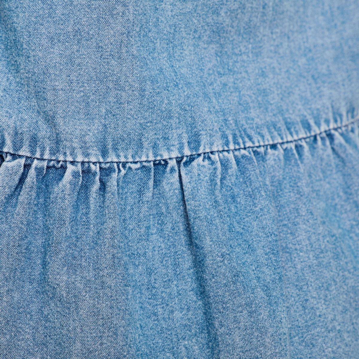 Blouse nouée en jean denim bleach femme
