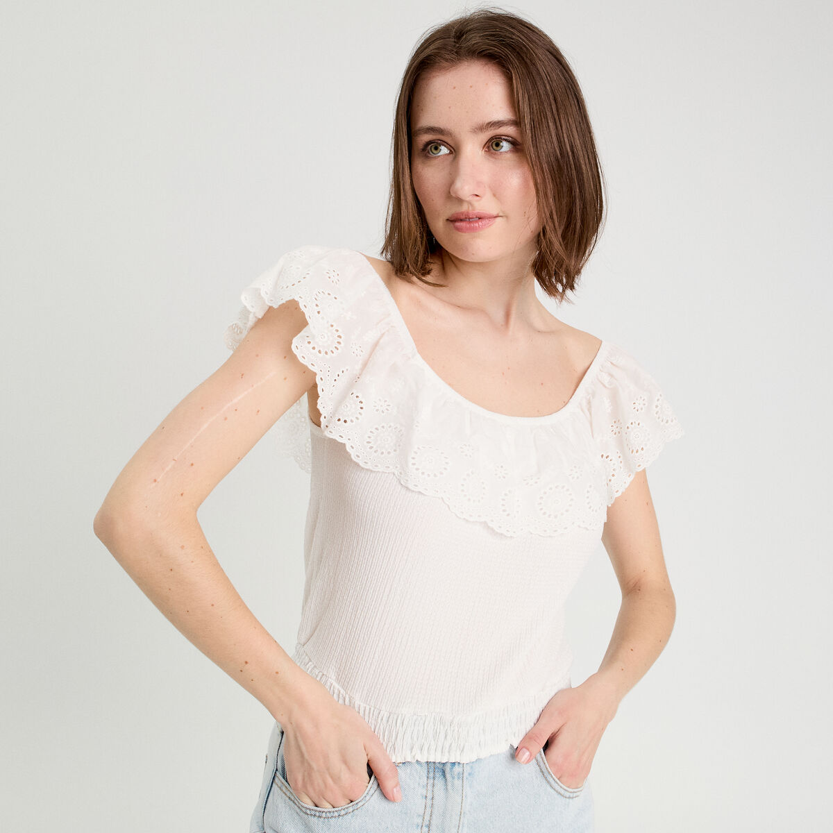Top sans manches ecru femme