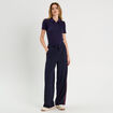 Polo manches courtes zippé bleu marine femme