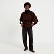 Poncho en fausse fourrure marron fonc&eacute; femme