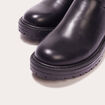 Bottes crantées avec boucles noir femme
