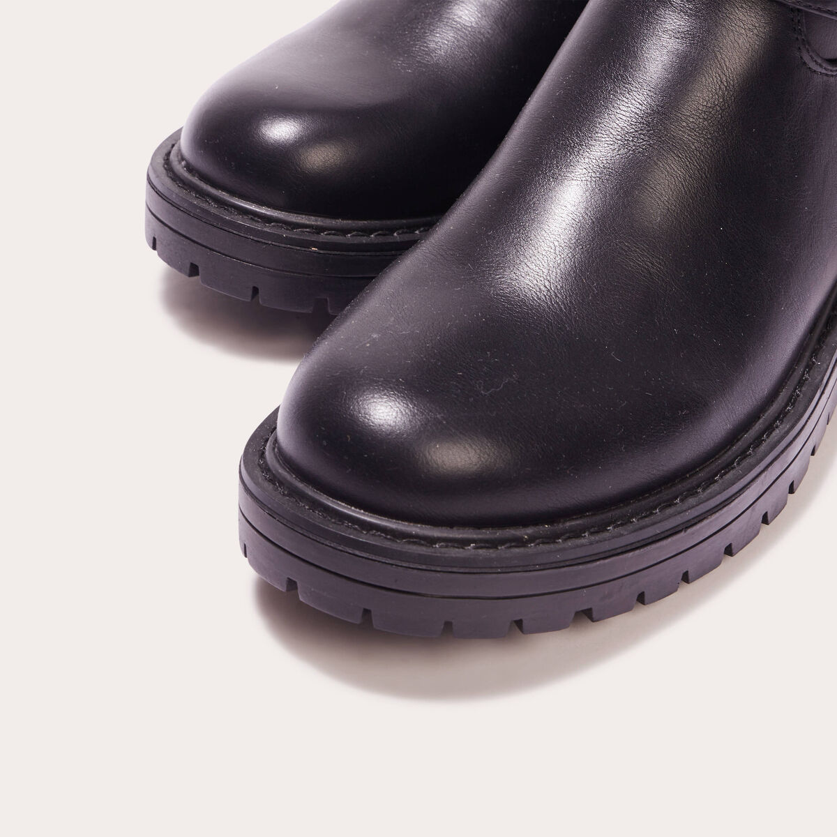 Bottes crantées avec boucles noir femme