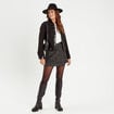 Jupe-short évasée en tweed noir femme