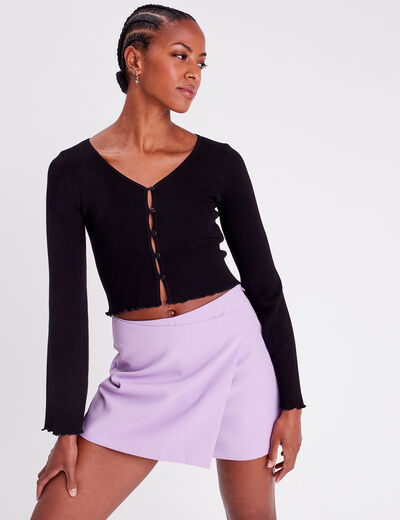 Gilet col en V bord vague noir femme