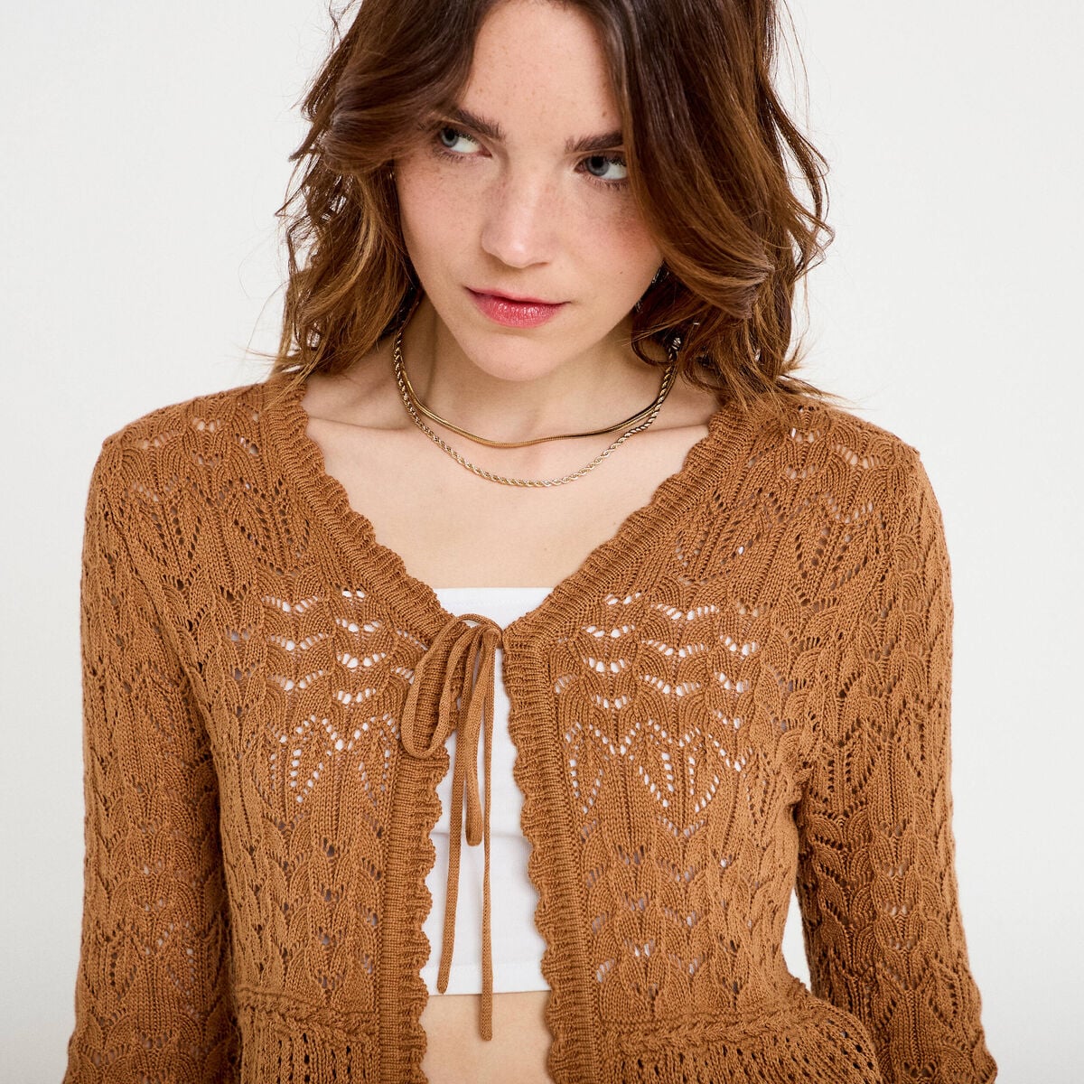 Gilet ajour&eacute; cintr&eacute; manches longues beige femme