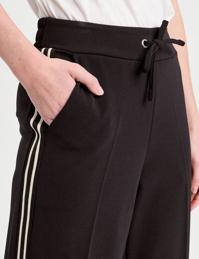Pantalon large style jogging noir femme