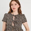 Blouse avec noeuds blanc femme