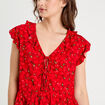 Blouse sans manches nouée rouge femme