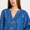 Blouse ample manches longues en jean blanc femme