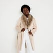 Manteau cintr&eacute; col ch&acirc;le manches longues beige femme