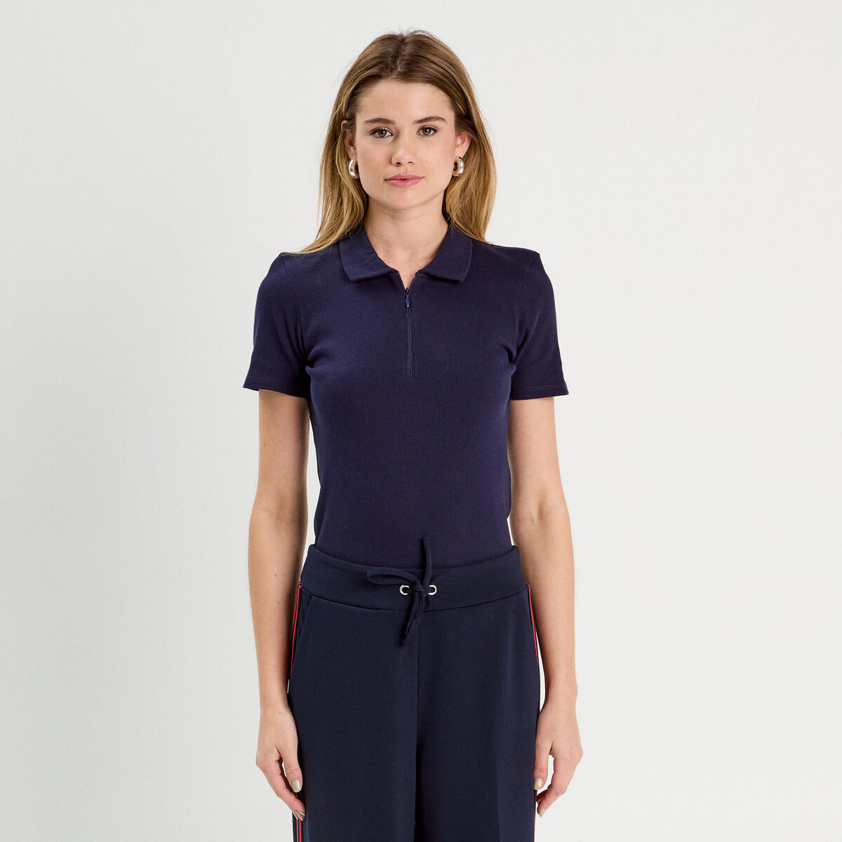 Polo manches courtes zippé bleu marine femme