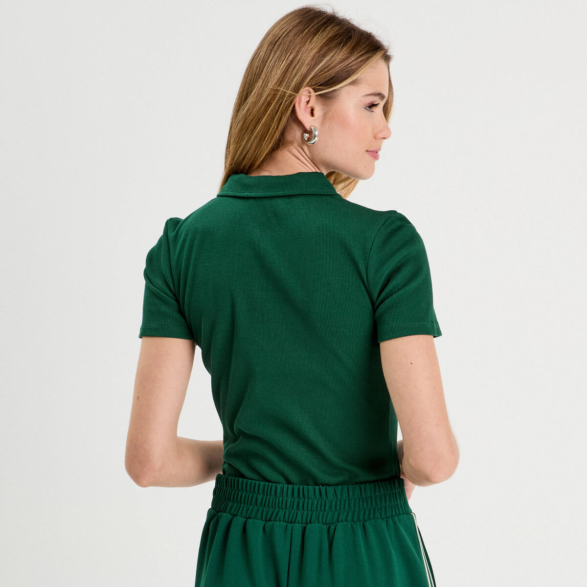 Polo manches courtes zipp&eacute; vert fonc&eacute; femme