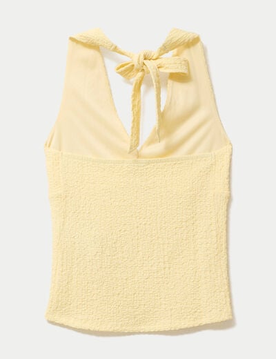 Top cintr&eacute; sans manches avec relief jaune pastel femme