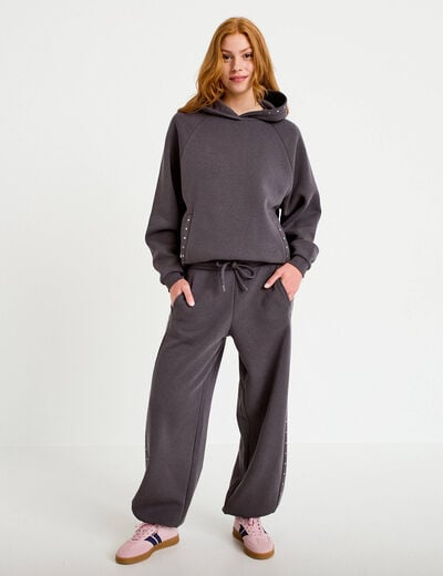 Jogging &agrave; d&eacute;tails clout&eacute;s taille basse gris fonc&eacute; femme