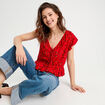 Blouse sans manches nouée rouge femme