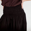 Jupon &eacute;vas&eacute; taille smock&eacute;e noir femme